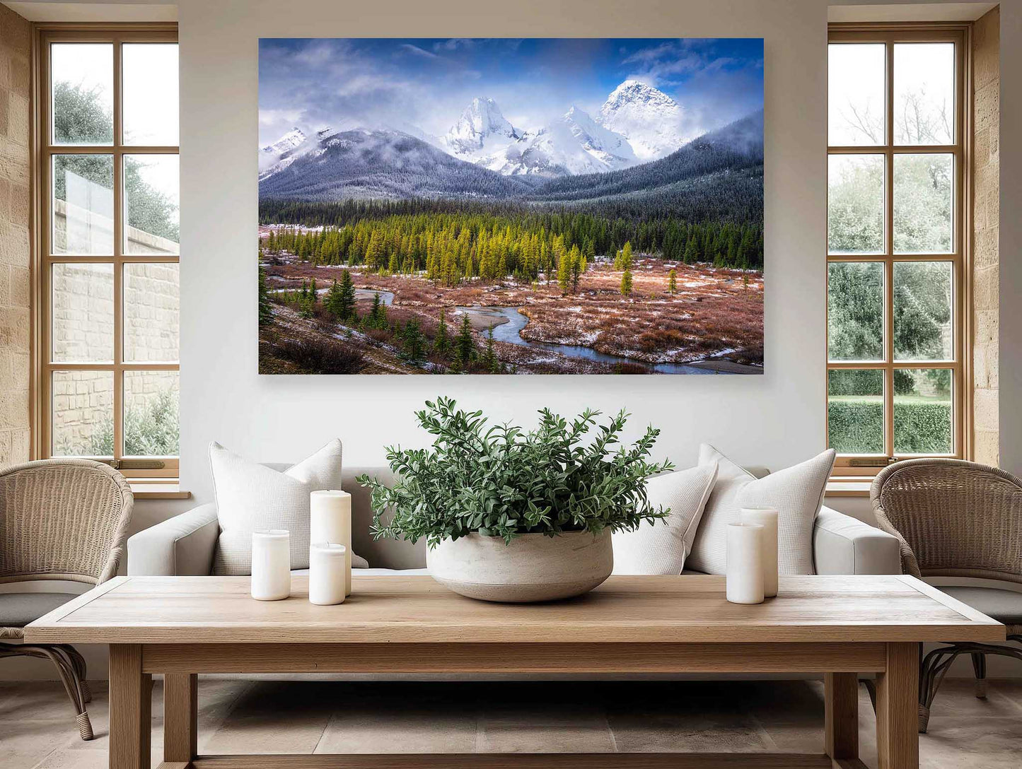 Living room with a large mountain landscape painting on the wall, wooden coffee table, and chairs. Kananaskis Country, Alberta, Canada, Canadian Rockies, Beautiful fine art landscape photography wall art limited edition prints for sale.
