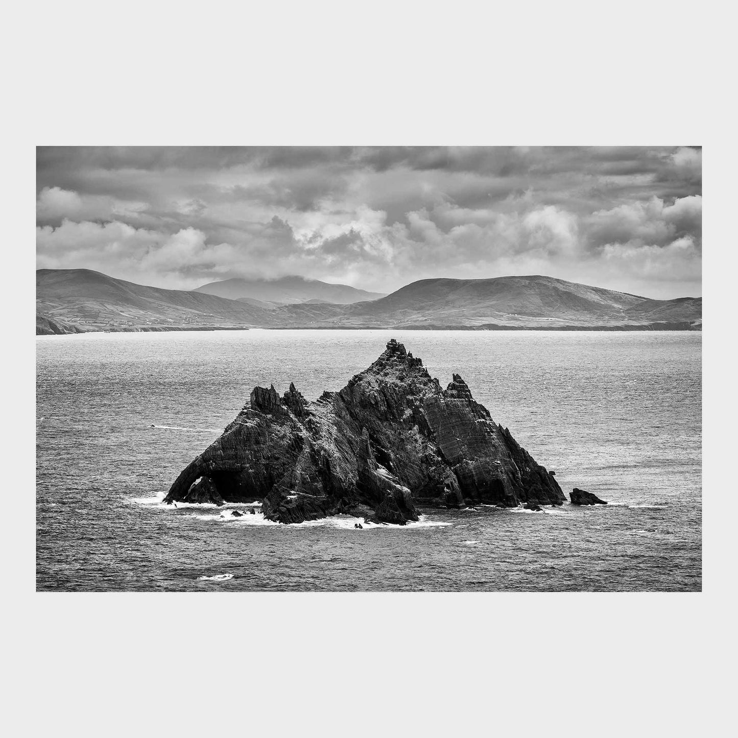 Black and white landscape of Skellig Michael island with surrounding sea and mountains. Little Skellig, Co. Kerry, Ireland, Luke Skywalker, Star Wars Island, Beautiful fine art landscape photography wall art prints for sale. Dermot O'Kane