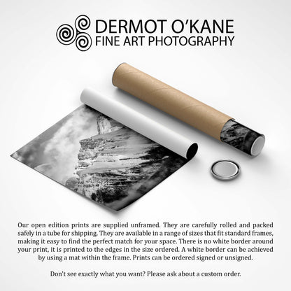 Rolled-up black and white art print with cardboard tube on a white background, featuring Dermot O'Kane Fine Art Photography. 