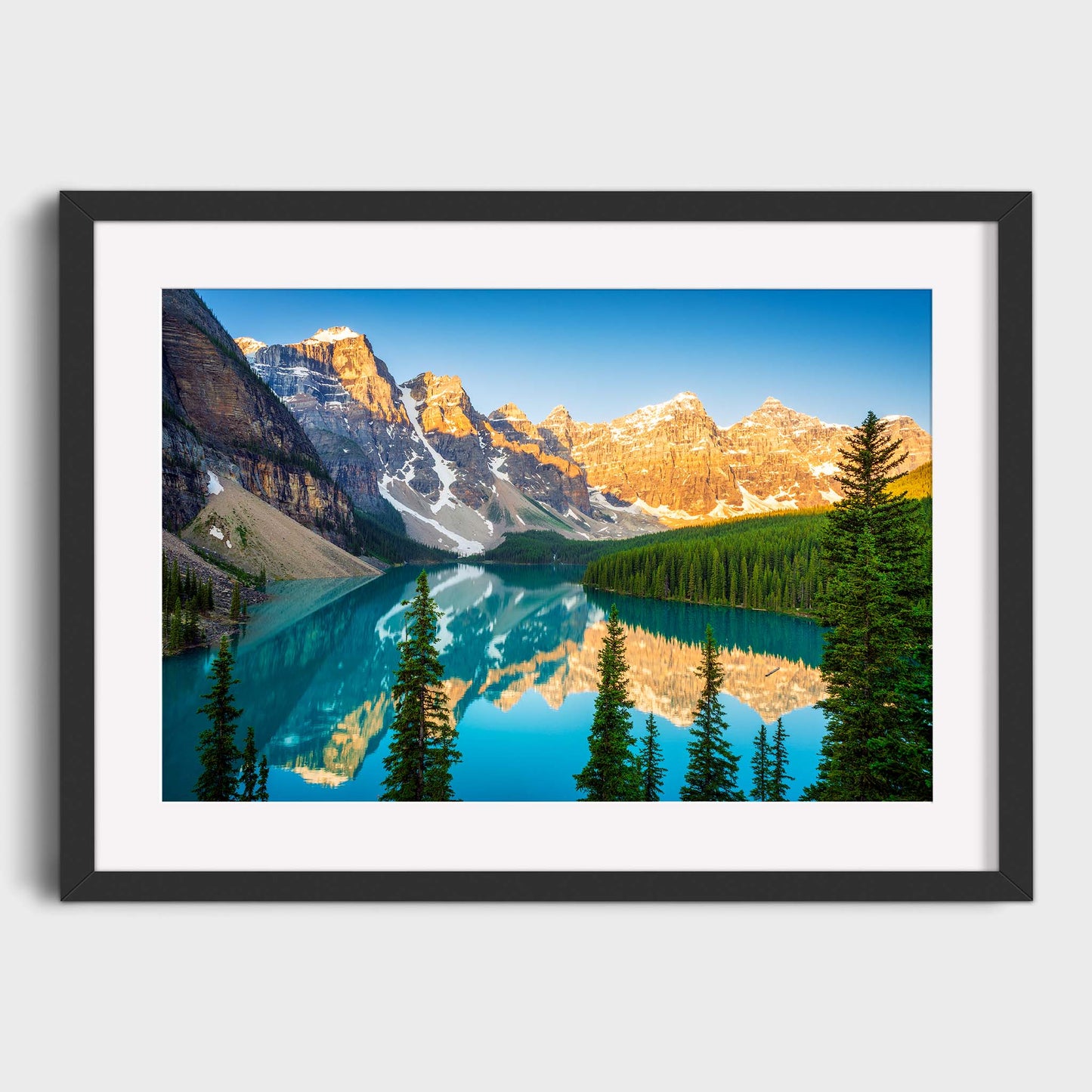 Framed photograph of a mountain lake with trees and snow-capped peaks. Moraine Lake, Banff National Park, Alberta, Canada, Beautiful fine art landscape photography wall art prints for sale. Dermot O'Kane