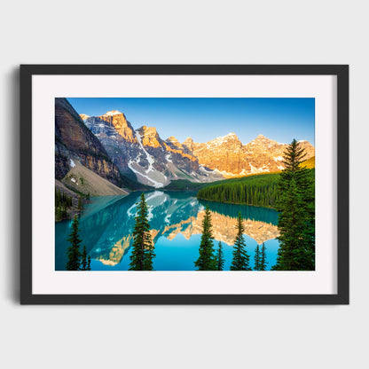 Framed photograph of a mountain lake with trees and snow-capped peaks. Moraine Lake, Banff National Park, Alberta, Canada, Beautiful fine art landscape photography wall art prints for sale. Dermot O'Kane