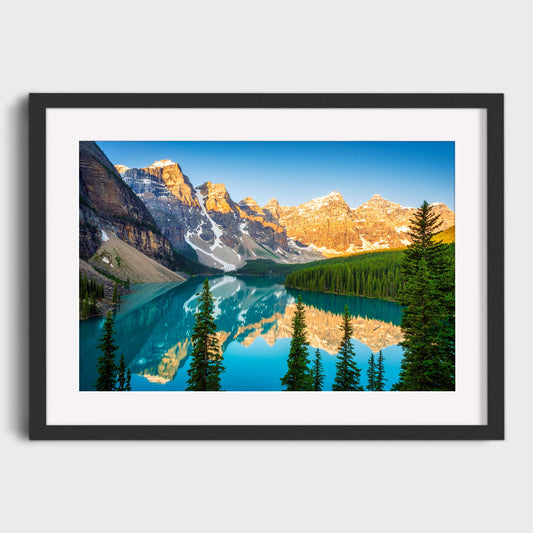 Framed photograph of a mountain lake with trees and snow-capped peaks. Moraine Lake, Banff National Park, Alberta, Canada, Beautiful fine art landscape photography wall art prints for sale. Dermot O'Kane