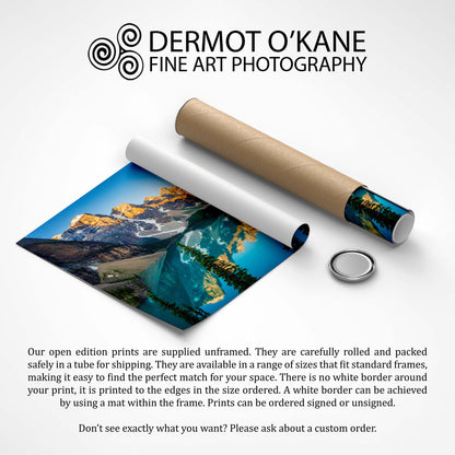 Rolled-up photo of a mountain landscape with packaging and text about Dermot O'Kane Fine Art Photography.