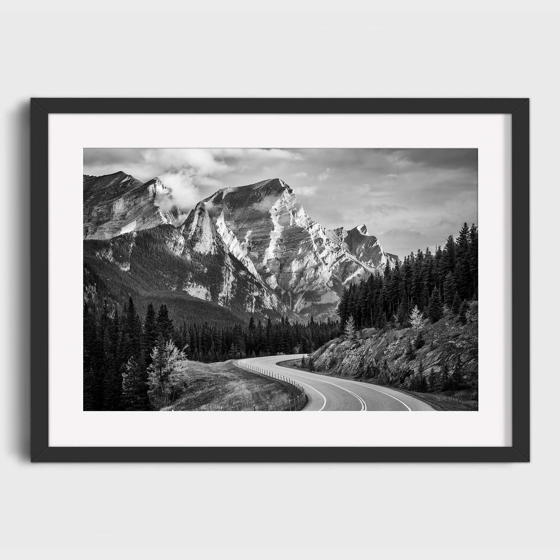 Framed black and white print of a mountain landscape with a winding road. Kananaskis Country, Fine Art Photography, Dermot O'Kane, Rocky Mountains, Alberta, Canada