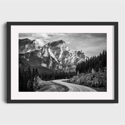 Framed black and white print of a mountain landscape with a winding road. Kananaskis Country, Fine Art Photography, Dermot O'Kane, Rocky Mountains, Alberta, Canada
