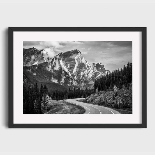 Framed black and white print of a mountain landscape with a winding road. Kananaskis Country, Fine Art Photography, Dermot O'Kane, Rocky Mountains, Alberta, Canada