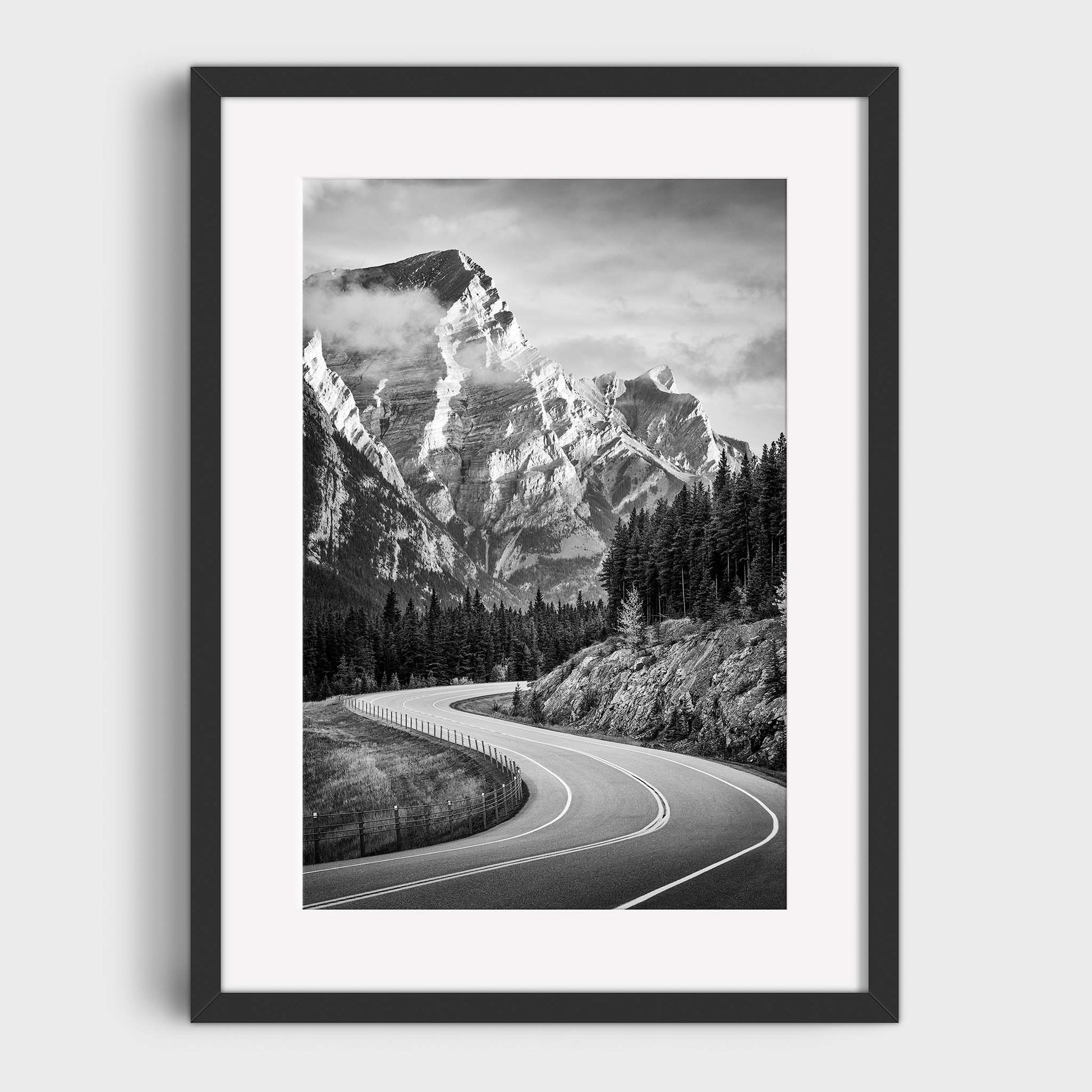Framed black and white print of a mountain landscape with a winding road. Kananaskis Country, Fine Art Photography, Dermot O'Kane, Rocky Mountains, Alberta, Canada