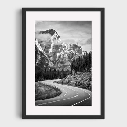 Framed black and white print of a mountain landscape with a winding road. Kananaskis Country, Fine Art Photography, Dermot O'Kane, Rocky Mountains, Alberta, Canada